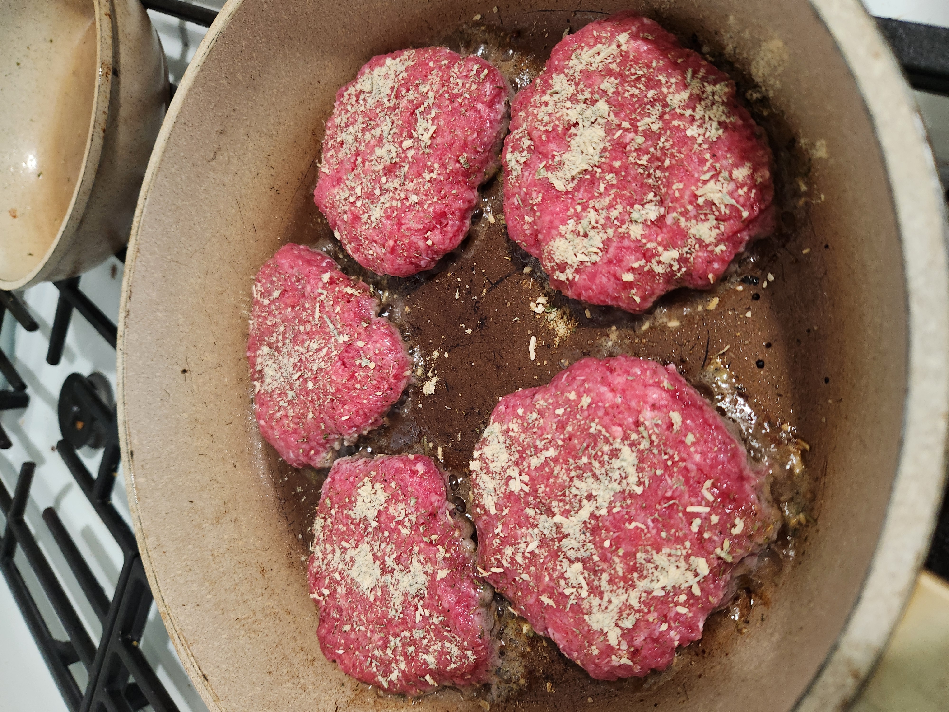 Burger patties seasoned with Crooked Gate No. 01 Ranch