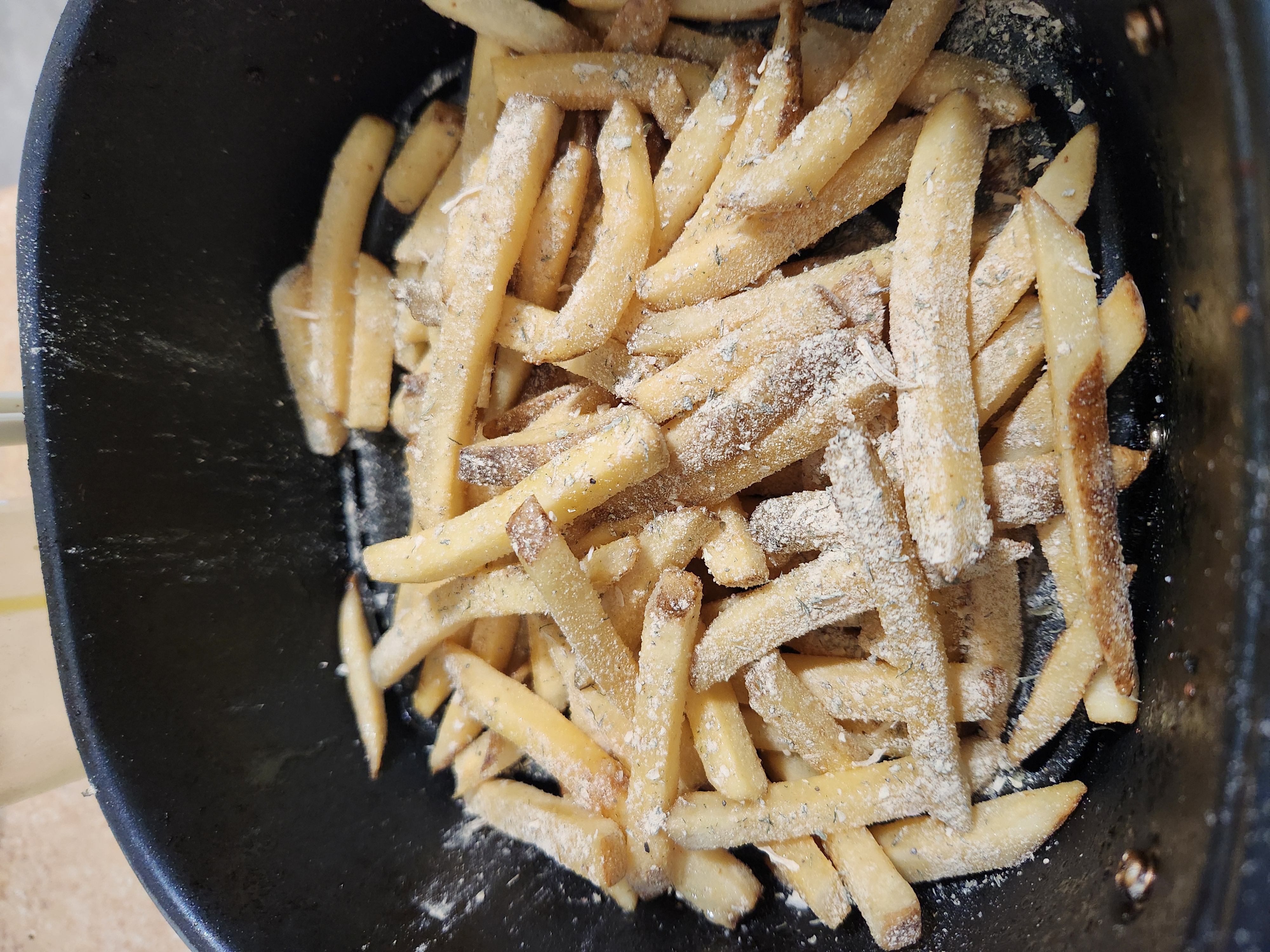 Potatoes seasoned with Crooked Gate Ranch before cooking